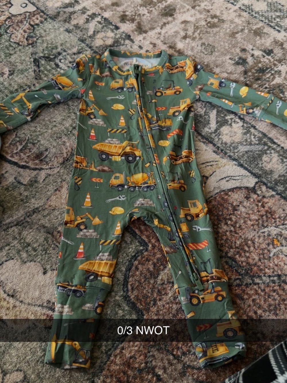 Posh Peanut Green Construction-Print Footed Pajamas with Yellow Trucks